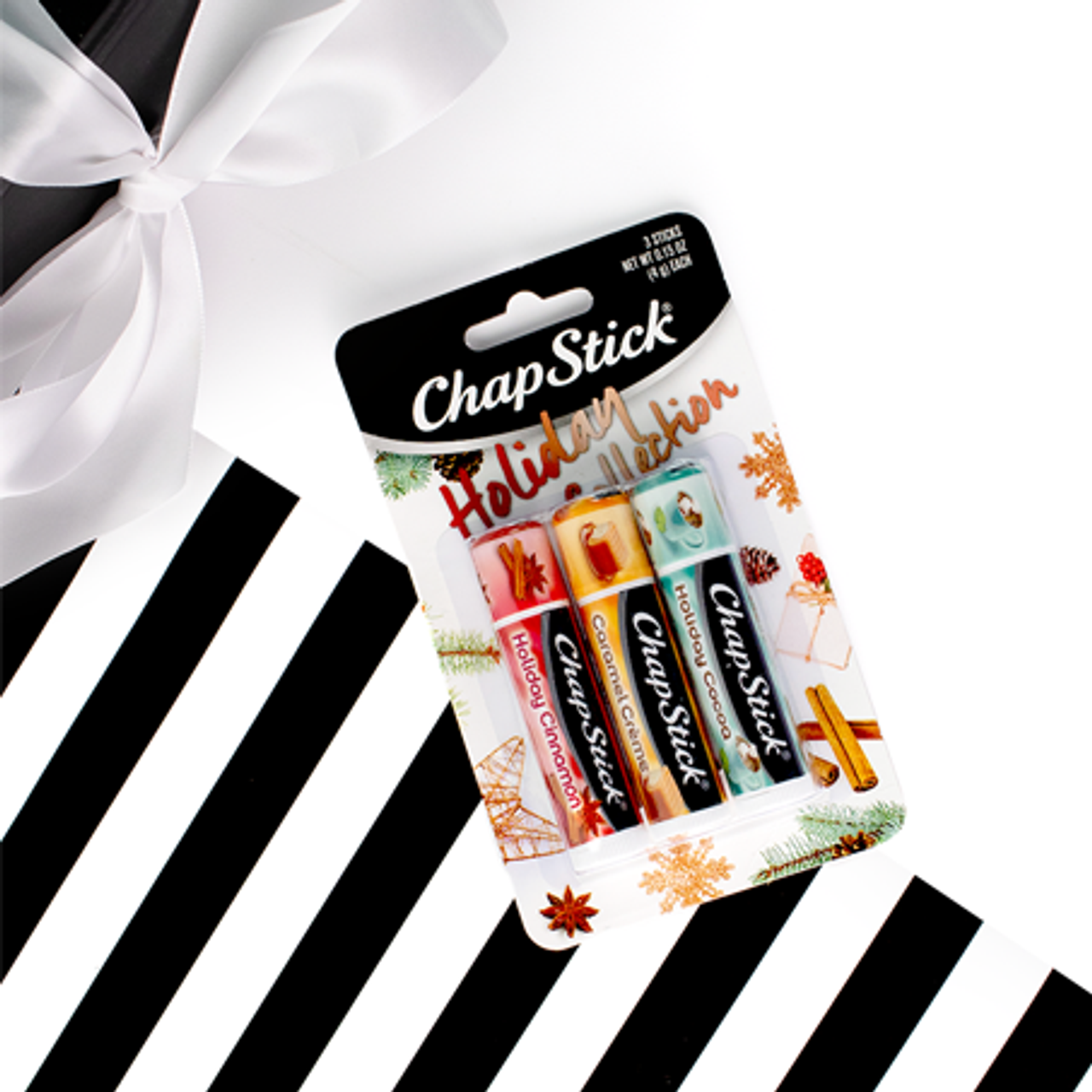 
                  
                    ChapStick® Holiday Collection with Holiday Cinnamon, Caramel CrÃ¨me and Holiday Cocoa Flavors lip balms.
                  
                